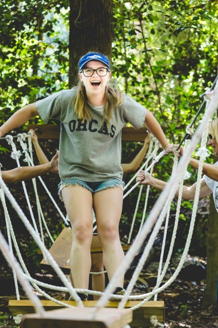 Camper on the low ropes course